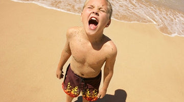 kid chafing at the beach